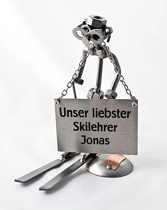 Schraubenmännchen Skilehrer mit Schild