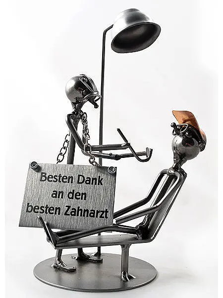 Schraubenmännchen Zahnarzt oder Zahnmediziner mit Schild