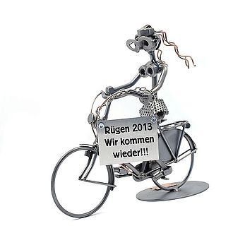 Schraubenmännchen Frau auf Hollandrad mit Schild