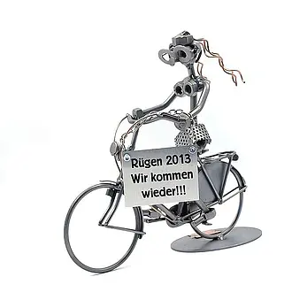 Schraubenmännchen Frau auf Hollandrad mit Schild