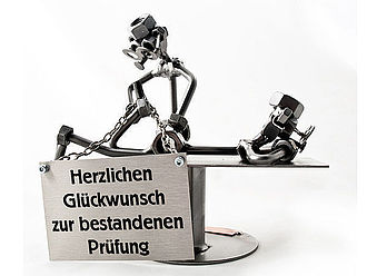 Schraubenmännchen Osteopath mit Schild Schraubenmännchen Osteopath mit Schild