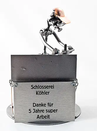 Schraubenmännchen Schlosser mit Schild