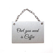Eule mit Schild
