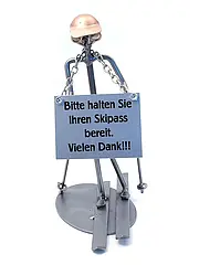 Schraubenmännchen Skilehrer mit Schild