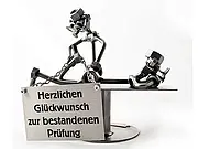 Schraubenmännchen Osteopath mit Schild