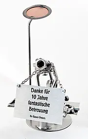 Schraubenmännchen Tierarzt mit Schild