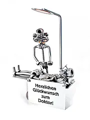 Schraubenmännchen Facharzt mit Schild