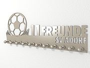 Hochwertige Edelstahl Garderobe für den Fußballverein mit 11 Haken Diese Garderobe können Sie mit dem Namen des Fußballvereins versehen lassen. Bitte geben Sie bei der Bestellung die gewünschten Text ... Garderobe für den Fußballverein in Edelstahl