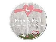 rundes Schild "Frohes Fest"